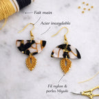 Boucles d’oreilles demi-lune motif léopard Micro Noeuds