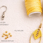 Boucles micro-macramé feuille navette Oraya matériaux fil nylon perles