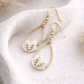 Boucles d’oreilles micro-macramé motif feuille – Crochets argent 925 & perle Micro Noeuds